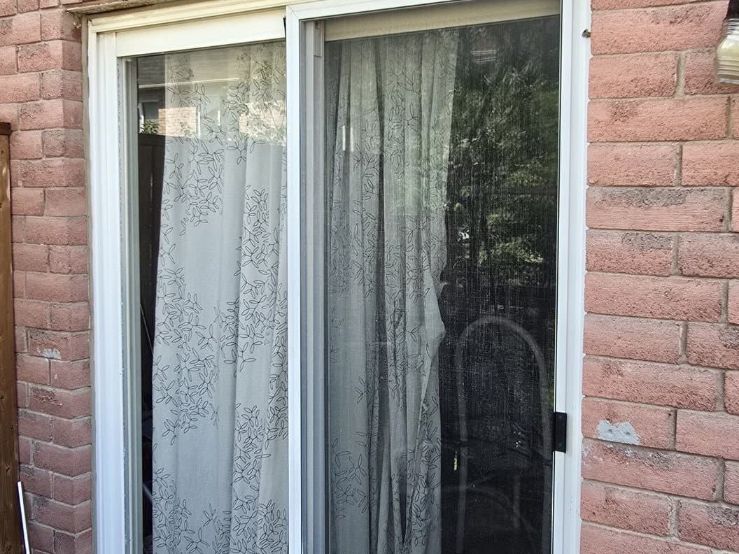 Sliding patio door with screen door — Window & Door Screens service by LuminaSky
